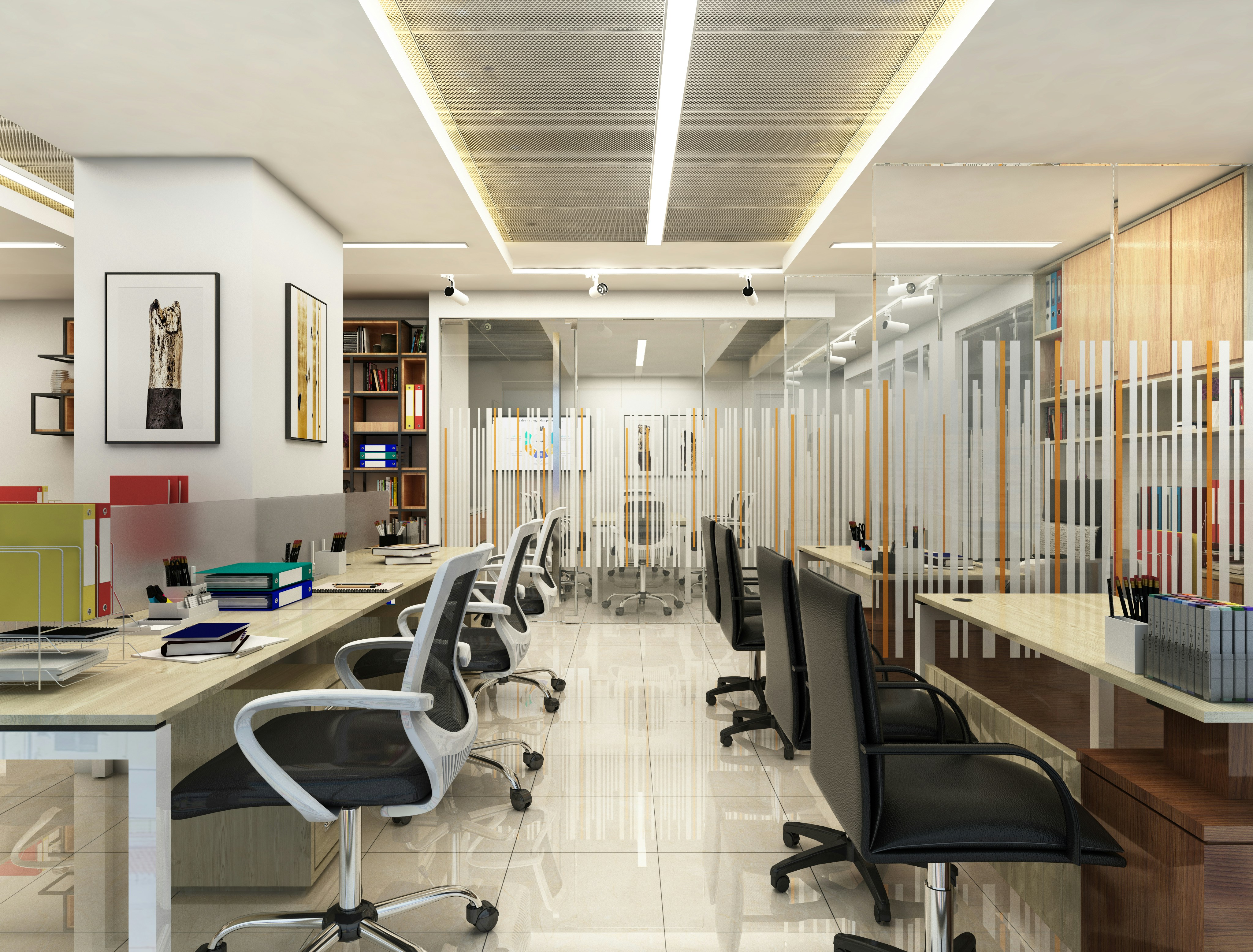Open office with desks, chairs, glass partitions, and modular storage